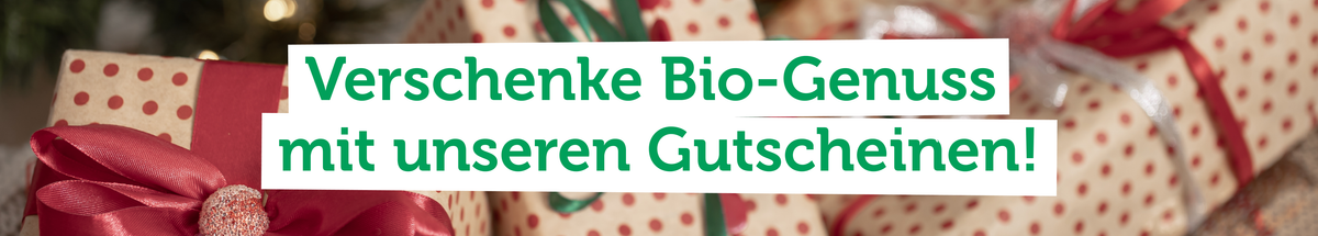 Werbebanner mit Geschenkpaketen. Text: "Verschenke Bio-Genuss mit unseren Gutscheinen!"