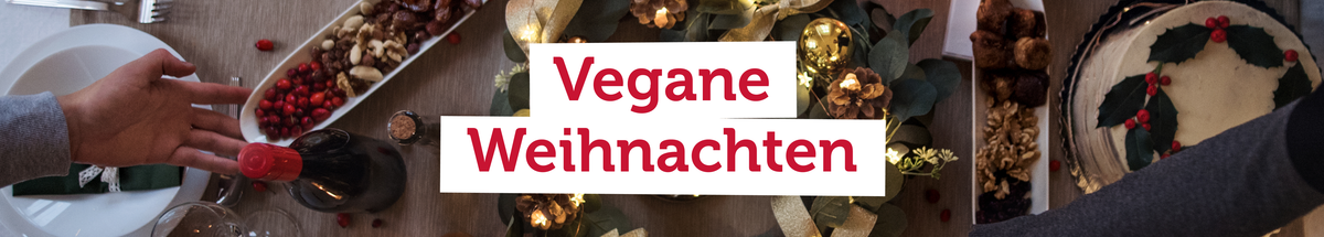 KI generiert: Ein gedeckter Tisch mit Weihnachtsdekoration. Text: "Vegane Weihnachten".