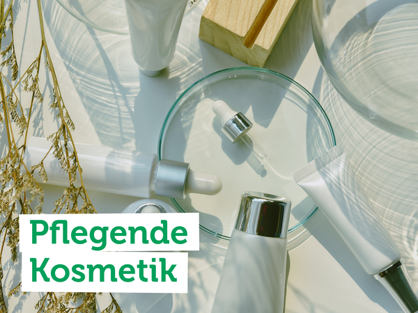 Kühe grasen auf einer Wiese; Text: "Weiderind vom Gut Peetzig".