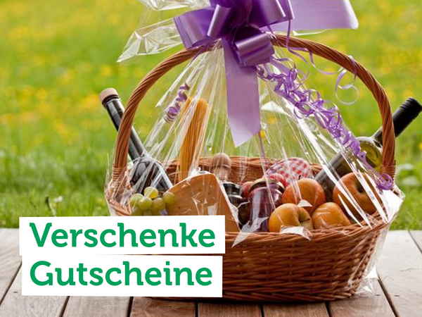 Ein Geschenkkorb mit Lebensmitteln; Text: "Verschenke Gutscheine".
