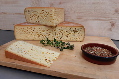Produktfoto zu Hofkäse italienische Kräuter, Rohmilch