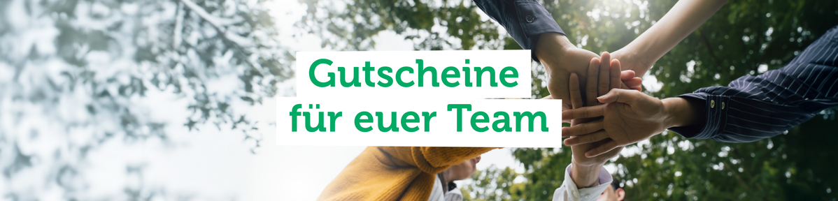 KI generiert: Mehrere Menschen halten gemeinsam ihre Hände übereinander. Text: "Gutscheine für euer Team".